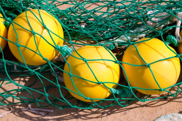 Redes de pesca woth bóia amarela — Fotografia de Stock