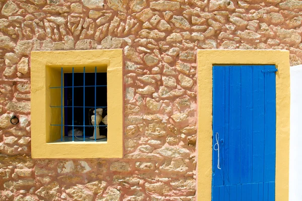 Mediterranean blue door and window in formentera — Stock Photo, Image