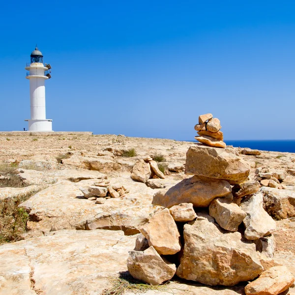 Barbaria formentera lighthouse přej kameny — Stock fotografie