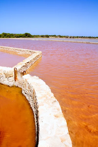stock image Formentera Ses Salines saltworks red water