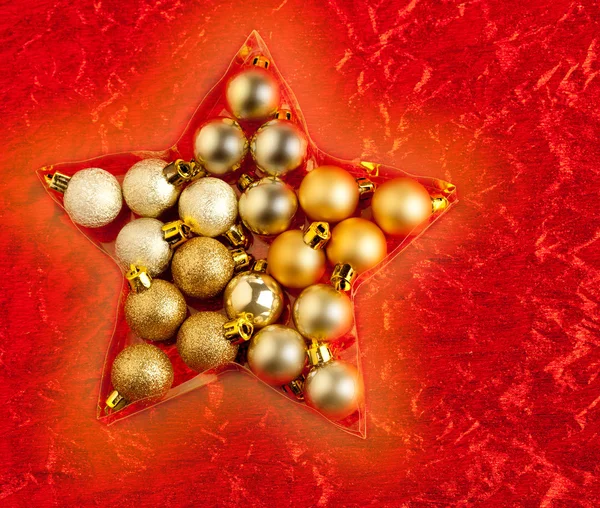 Julgranskulor i stjärnan formen på röd — 图库照片