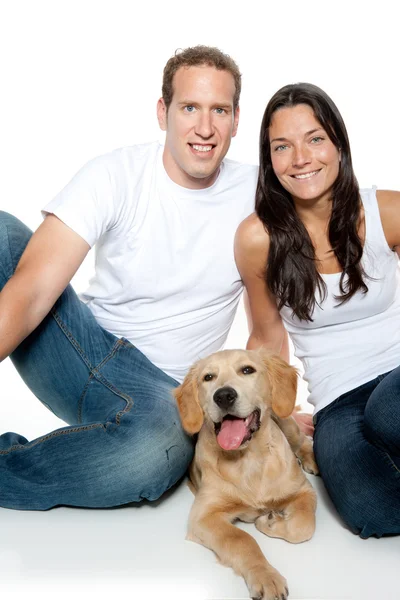 Couple in love puppy dog golden retriever — Stock Photo, Image