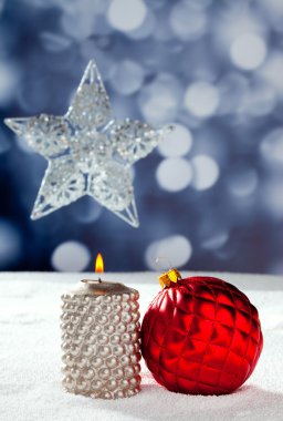 Christmas card of silver star bauble and candle clipart