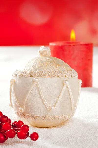 Christmas card of white velvet bauble and candle — Stock Photo, Image