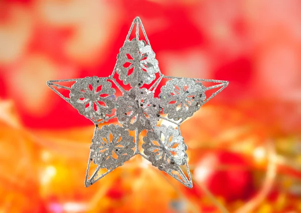 Kerstkaart van zilveren ster en rode vervagen — Stockfoto