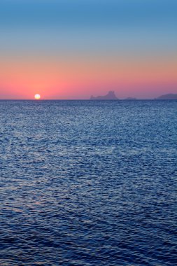 Ibiza sunset from Formentera with Es Vedra clipart