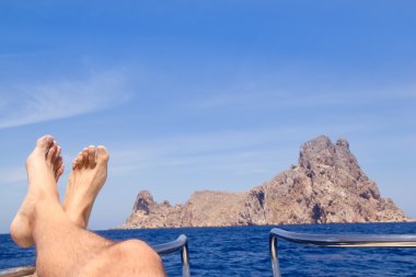 Ibiza relaxed Es Vedra boat bow view clipart
