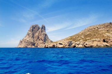 Ibiza Es Vedra island in Mediterranean blue clipart