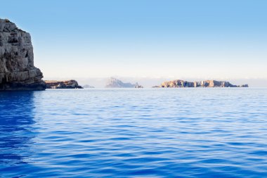 Ibiza Esparto island from a boat view clipart