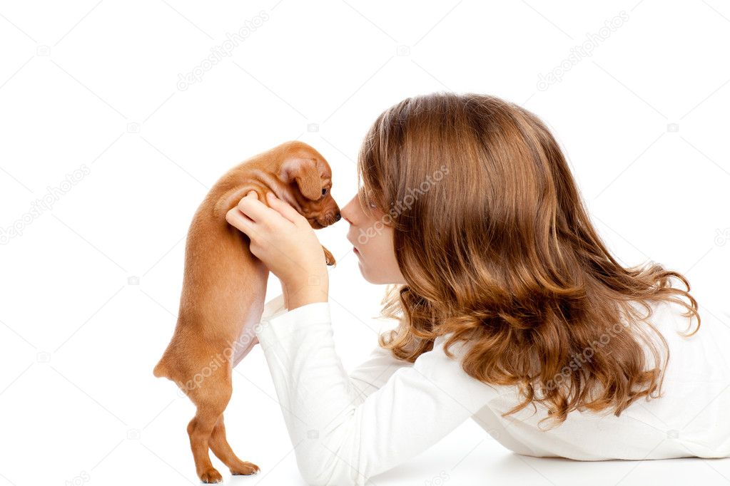 Brunette profile girl with dog puppy mini pinscher