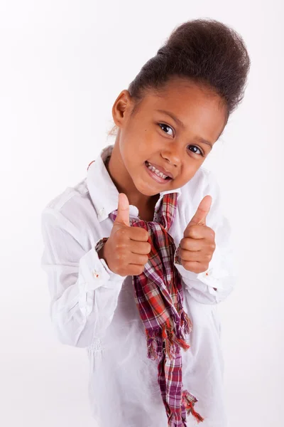 Sevimli küçük Afrika Asya kız thumbs up yapma — Stok fotoğraf