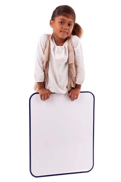 Cute little african american girl holding a whiteboard — Stock Photo, Image