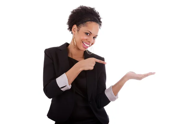 Unga afroamerikanska kvinnan presentera något på Tom palm — Stockfoto