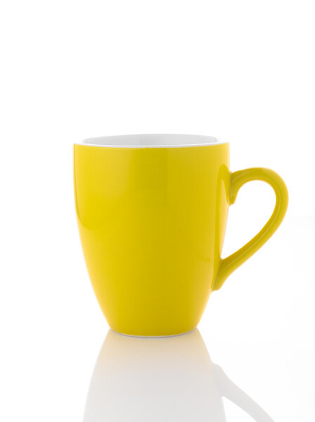 A yellow coffee cup on white background