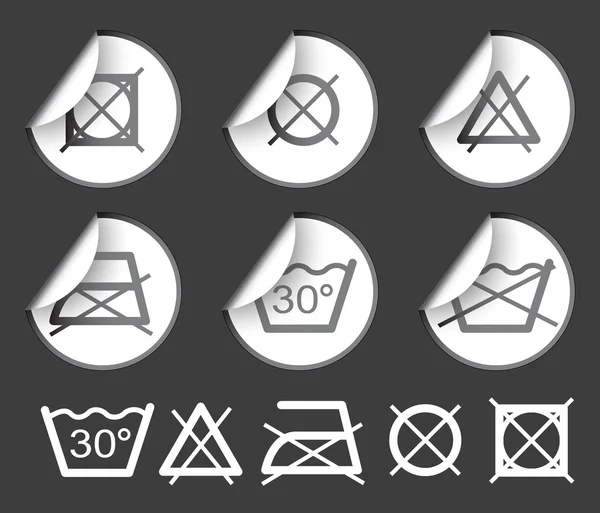 Etiquettes insignes et autocollants avec lavage (symboles textiles ) — Image vectorielle