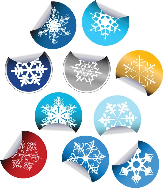 Круглі етикетки зі сніжинками — стоковий вектор