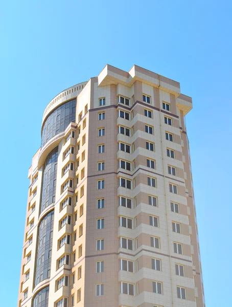 stock image Modern building on blue sky background