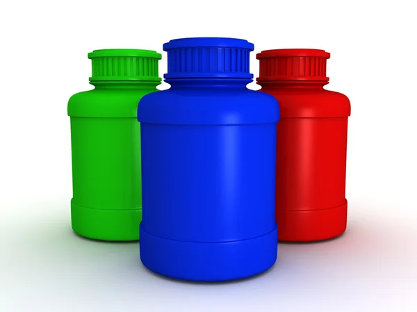 Drie kleurrijke flessen — Stockfoto