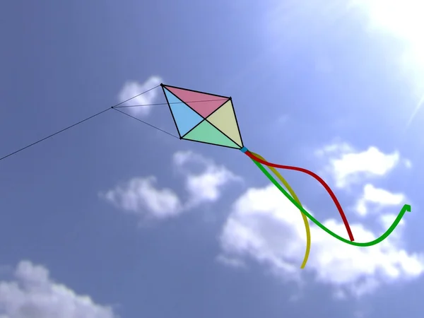 Veelkleurige kite met staart in de heldere blauwe hemel Rechtenvrije Stockfoto's
