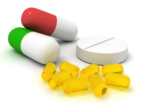 Färgglada piller isolerade på vitt — Stockfoto