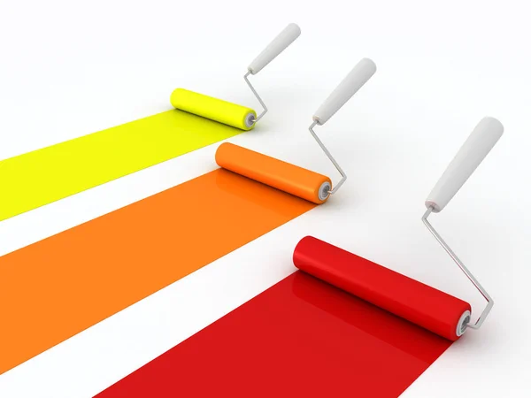 Paint rollers with paint on white background — Stock Fotó