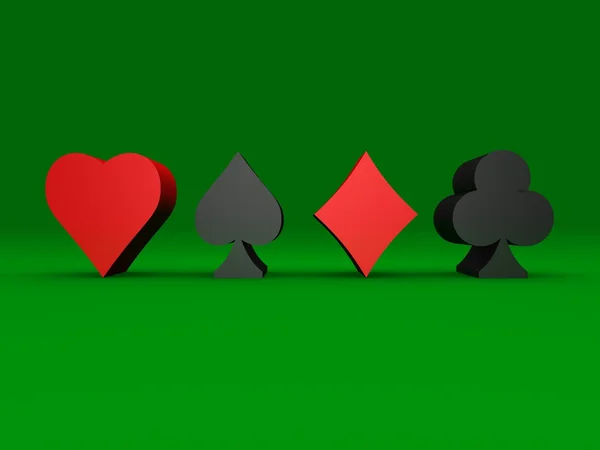 Jugar a los palos de cartas sobre fondo verde — Foto de Stock