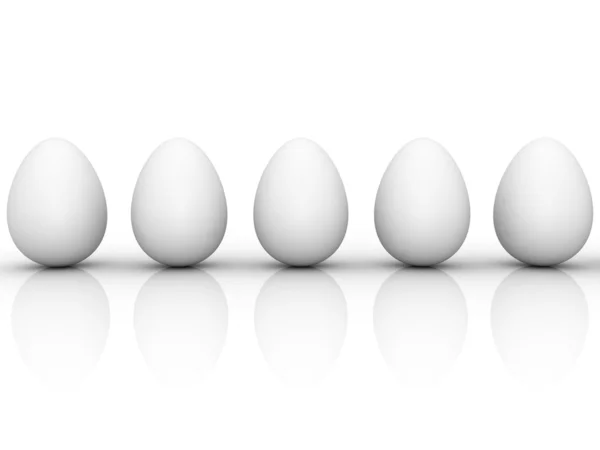Ряд белых куриных яиц — стоковое фото