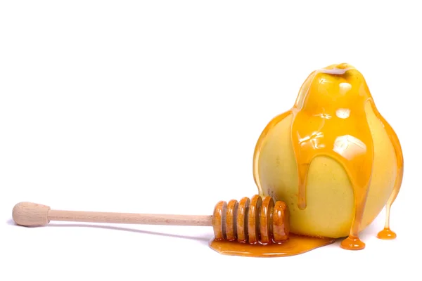 Κυδώνι φρούτα με την κουτάλα μέλι — Φωτογραφία Αρχείου
