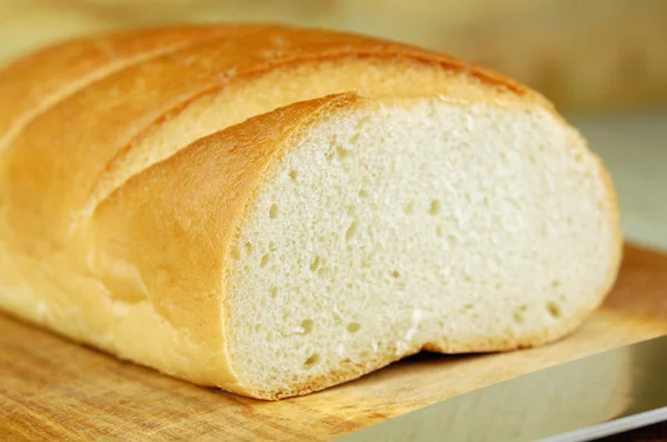 Chleba na řezací desce — Stock fotografie