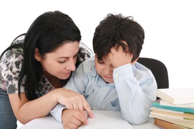 Mother helping with homework to her son indoor clipart