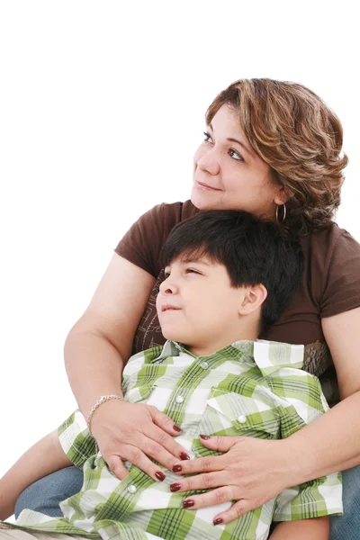 Little boy looking something interesting to his mother against w — Stock Photo, Image