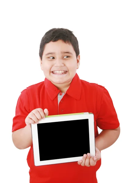 Retrato de un niño lindo feliz con su nueva tableta digital —  Fotos de Stock