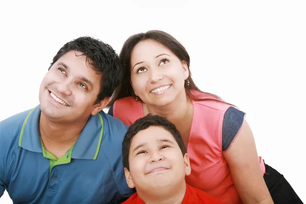 Family surprisingly looking up at copyspace — Stock Photo, Image