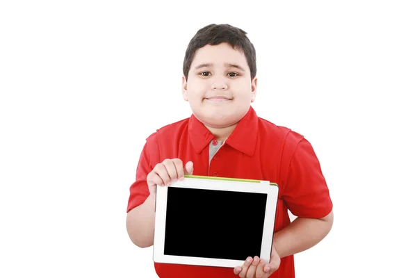 Junge hält Tablet-Computer isoliert auf weißem Grund — Stockfoto