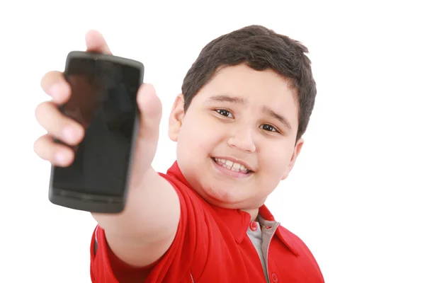 Pojke visar sin nya mobiltelefon — Stockfoto
