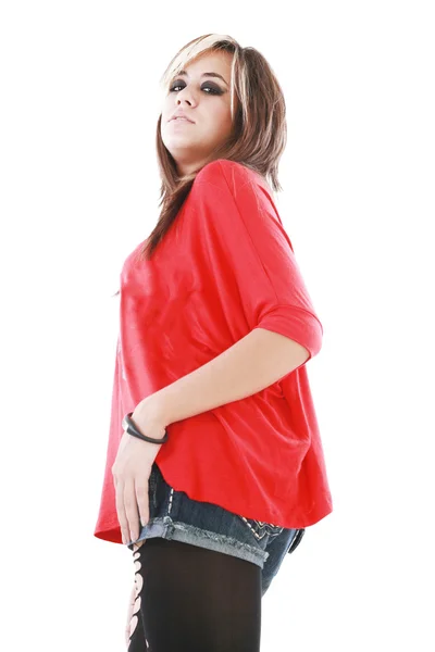 Uma jovem mulher vestindo uma roupa de estilo punk com uma meia líquida — Fotografia de Stock