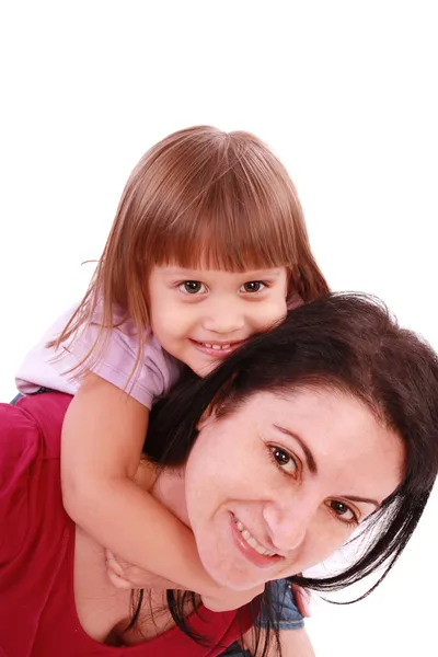 Anya és lánya mosolyogva be a kamera lencséje — Stock Fotó
