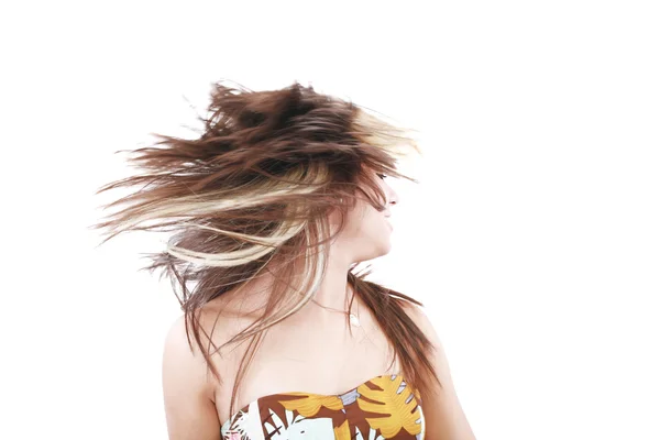Woman with hair billowing on white background — Stock Photo, Image