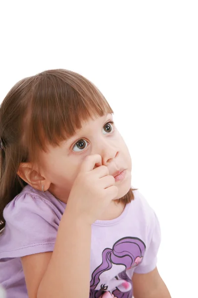 Baby's scratching her nose. Little child scratching her nose. — Stock Photo, Image