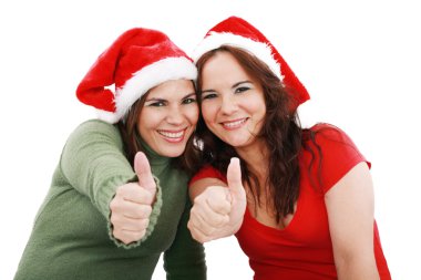 Happy young Christmas girls make a sign OK clipart