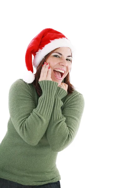 Здивована різдвяна жінка в капелюсі Санта, посміхаючись ізольована — стокове фото