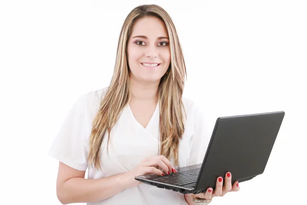 Beautiful caucasian doctor or nurse holding a laptop computer — Stock Photo, Image