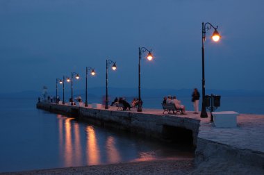 Pefkohori pier at night clipart