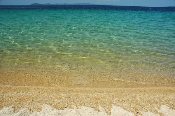 Toroni stranden vattentoroni のビーチの水 — Stockfoto