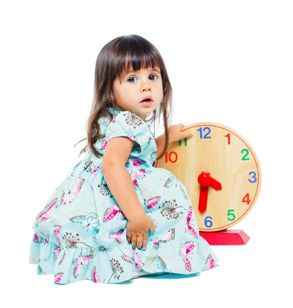 Mooi klein meisje met klok — Stockfoto