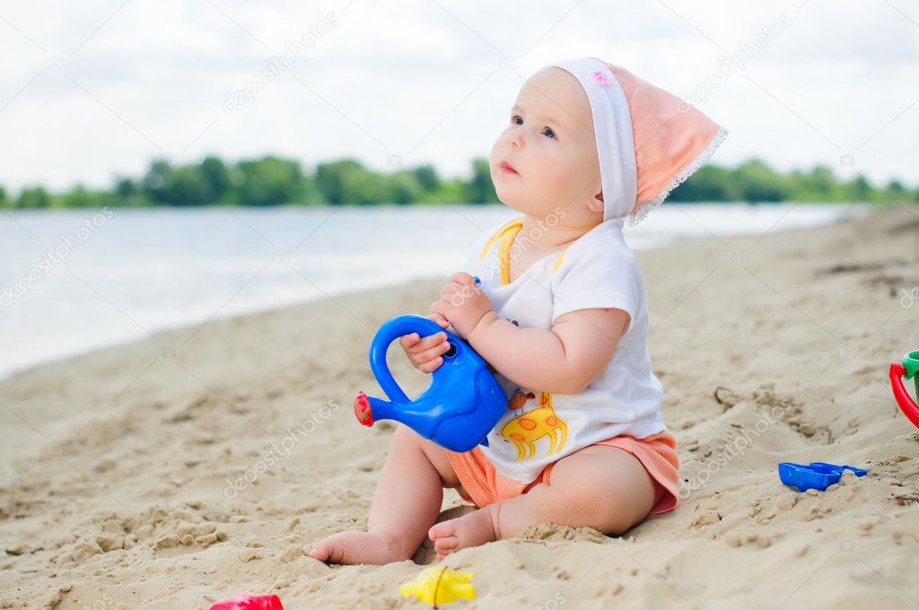 Little cute girl on the beach