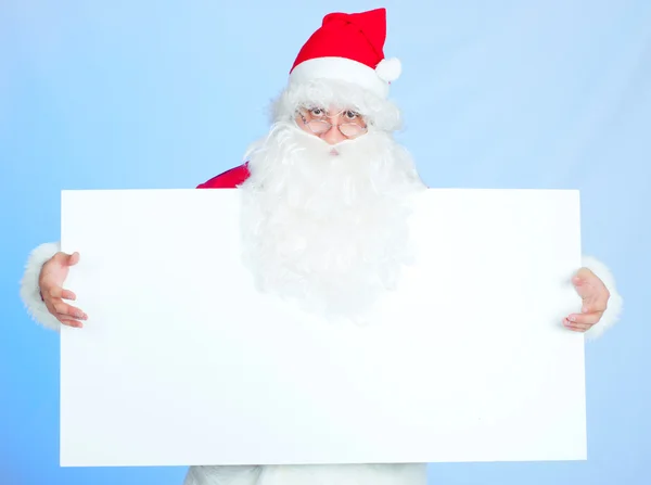 Різдвяний фон: Санта, подарунки, дитина — стокове фото