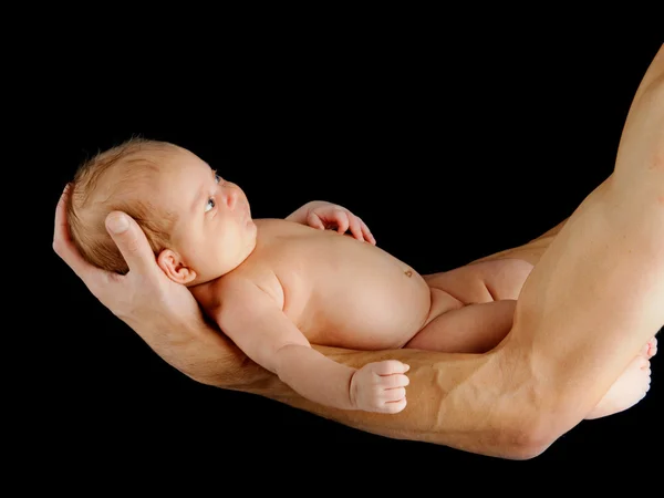 Vader bedrijf pasgeboren baby — Stockfoto