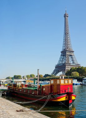 View of a living barge on the Seine in Paris clipart