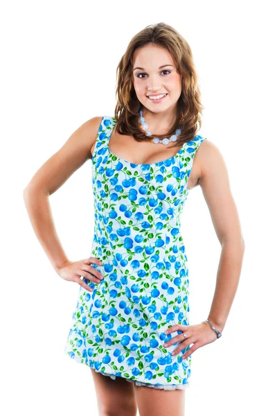 Mooi meisje in het dragen van leuke jurk met blauwe kersen — Stockfoto